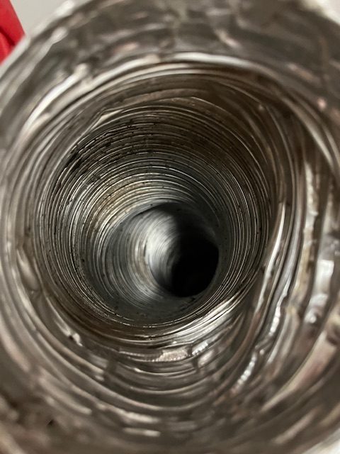 Lint removal during professional dryer vent cleaning